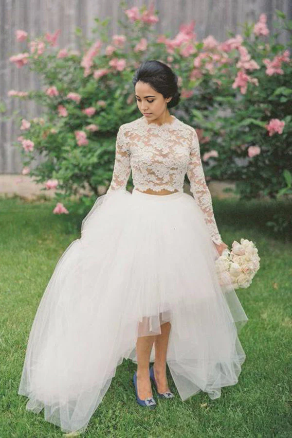 Impresionante vestido de novia de dos piezas con mangas largas y apliques